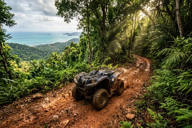 ATV quad bike riding a jungle mountain trail above Maenam on Koh Samui